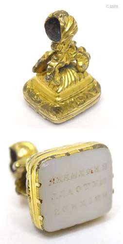 A 19thC gilt metal pendant fob seal, the seal with engraved ...