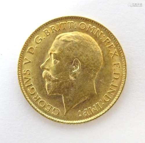 Coin : A George V 1914 gold half sovereign coin. Total weigh...