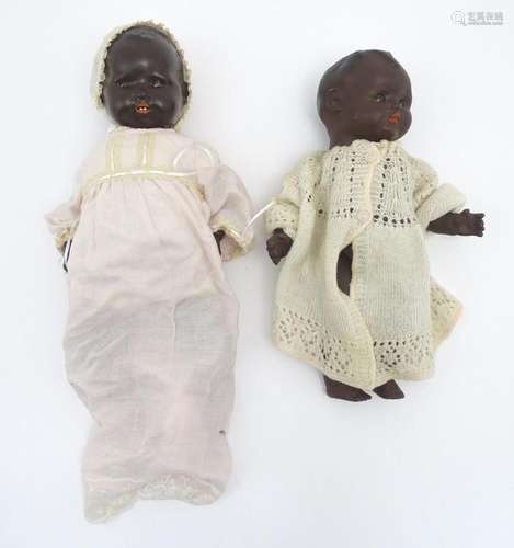 Toys: An early 20thC Armand Marseille black baby doll with a...