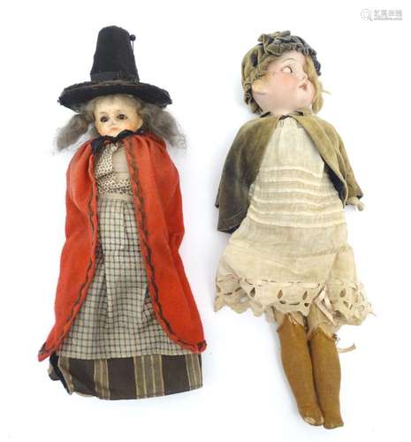 Toys: A 20thC German doll with a bisque head with blinking e...