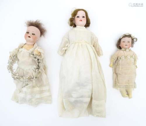 Toys: Three dolls comprising a German Armand Marseille doll ...