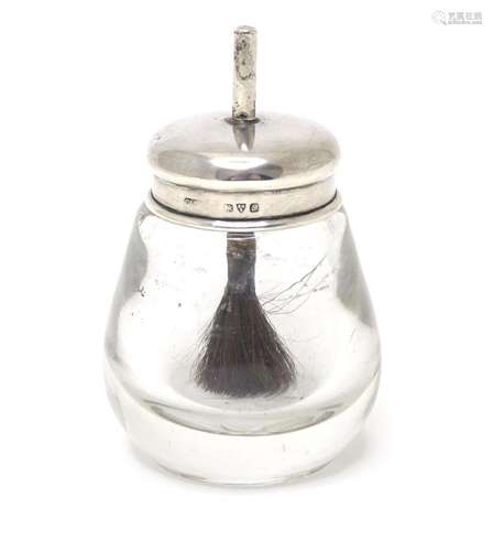 A glass toilet jar of stylised pear form with silver mount a...