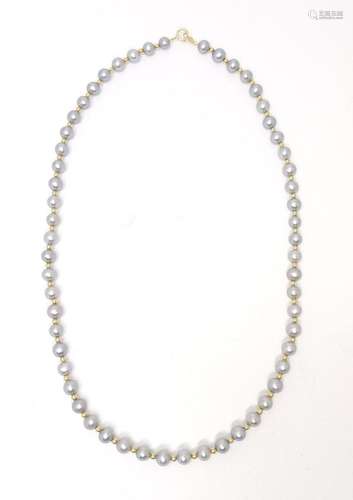 A lavender / grey pearl necklace with a 14ct gold clasp and ...