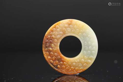 A White and Russet Jade Bi Disc, Probably Han Dynasty (Priva...