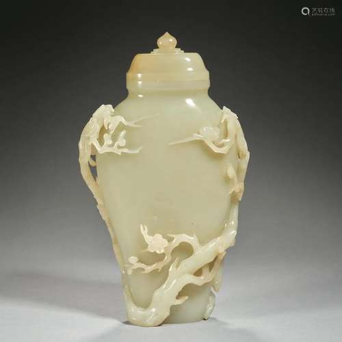 A Pale Celadon Jade 'Prunus' Vase with Cover, Qing D...