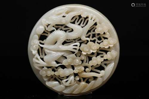 A White Jade 'Dragon' Reticulated Plaque, Qing Dynas...