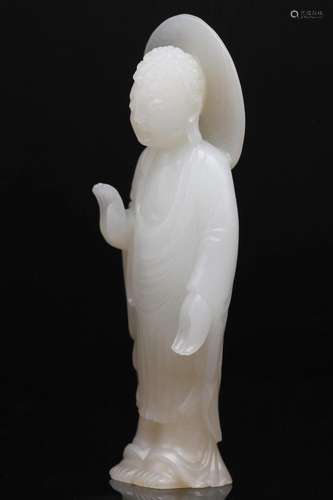 A White Jade Carving of a Standing Buddha, Qing Dynasty (Lyo...