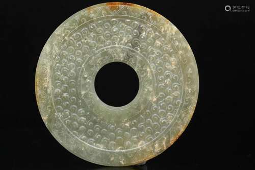 A Large Celadon Jade Bi Disc, Spring and Autumn Period to Wa...