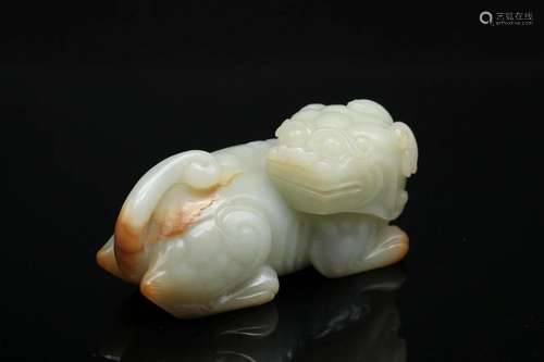 A Pale Celadon Carving of 'Qilin', Qing Dynasty (Pri...