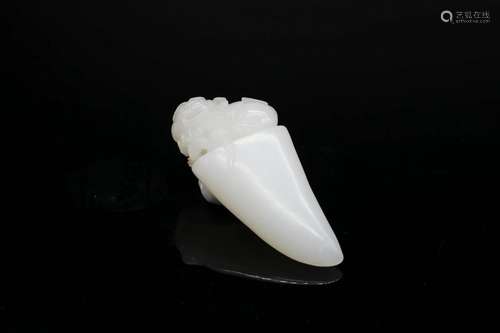 A White Jade Fang-Shaped Carving , Qing Dynasty (Bonhams Lon...