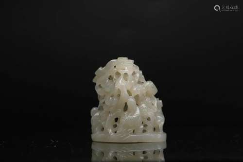 A Pale Celadon Jade Carving of Small Boulder, Late Ming to e...