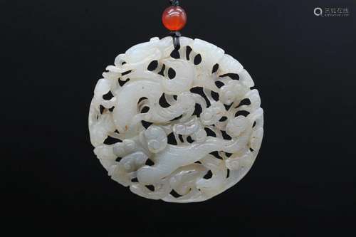 A White Jade Openwork Dragon Plaque, Qing Dynasty (Private E...