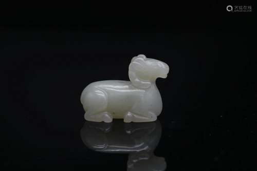 A White Jade Carving of a Ram, Ming Dynasty (Private English...