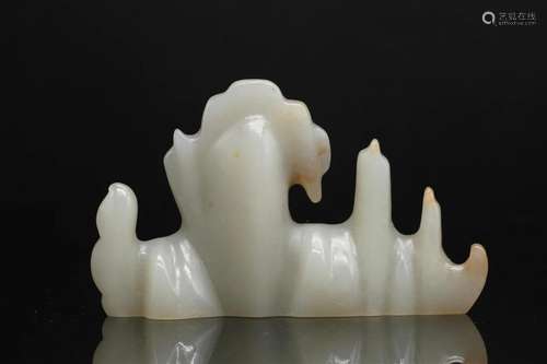 A Pale Celadon Jade 'Mountain' Brushrest, Qing Dynas...