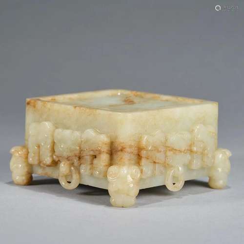 A white and Russet Jade Archaistic Duan Inkstone, Qing Dynas...