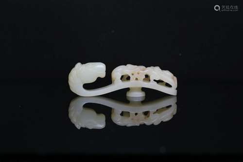 A White Jade 'Monkey on Horse' Belt Hook, Qing Dynas...