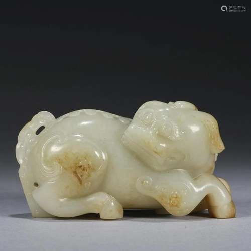 A White Jade 'Mythical Beast', Qing Dynasty (Private...