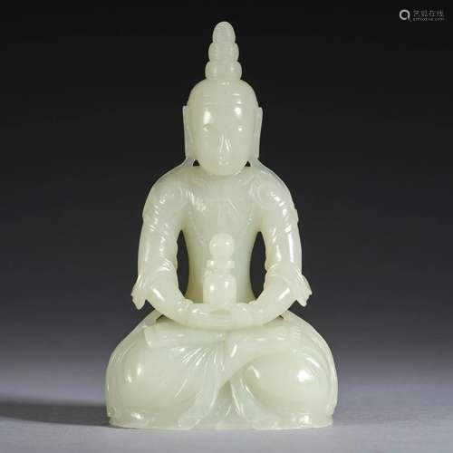 A White Jade Figure of a Sitting Buddha, Qing Dynasty (Priva...