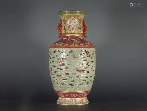 CHINESE FAMILLE-ROSE OPENWORK HANDLED ROTATING VASE DEPICTIN...