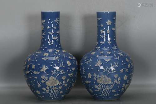 TWO CHINESE SKY-BLUE-GLAZED GLOBULAR VASES DEPICTING 'BU...