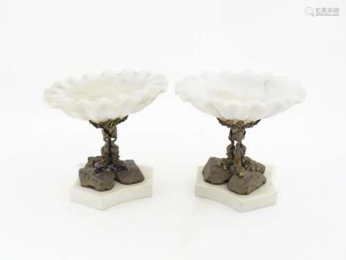 A pair of early 20thC tazzas with white marble shell formed ...