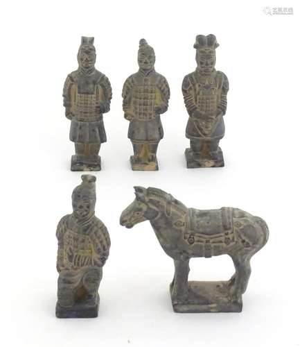 Five Chinese terracotta models comprising four warrior figur...