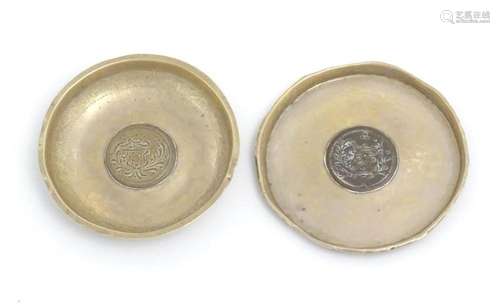 Two white metal dishes of circular form with inset Arabic / ...