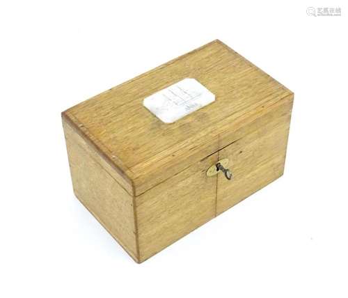 A 20thC oak box with hinged lid, the lid with engraved mothe...