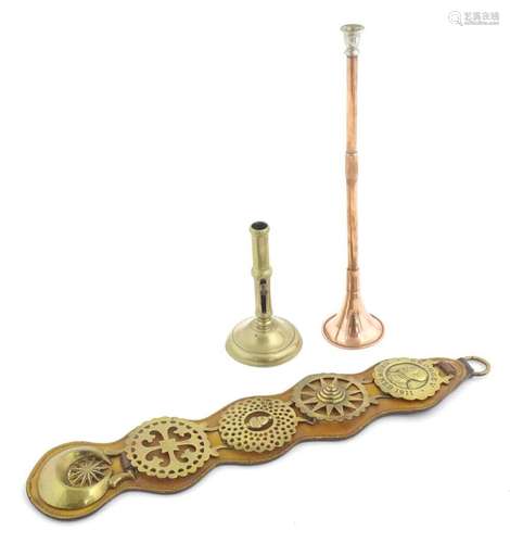 A 19thC brass candlestick with side ejector. Together with a...