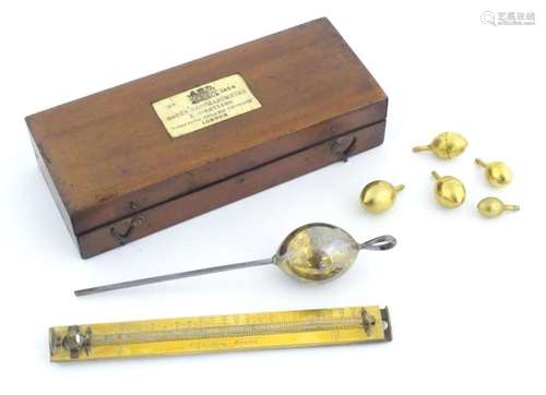 A 20thC mahogany cased Bates Saccharometer by Ludwig Oertlin...