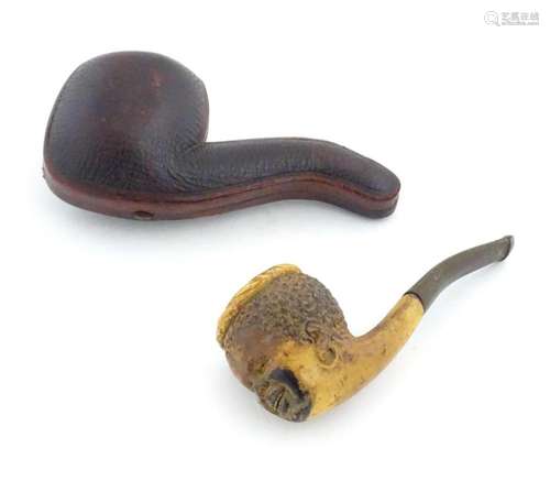 A 19thC carved meerschaum pipe the bowl depicting a smiling ...