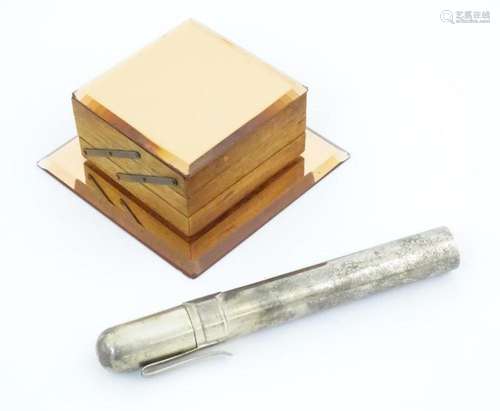 A 20thC silver plate cigar case containing a Don Pablo Cigar...