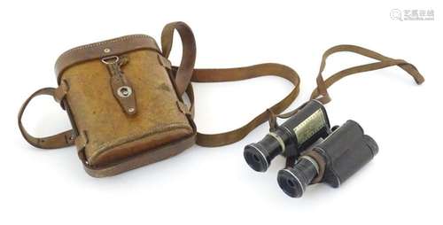 A pair of early 20thC cased field binoculars by Huet & C...