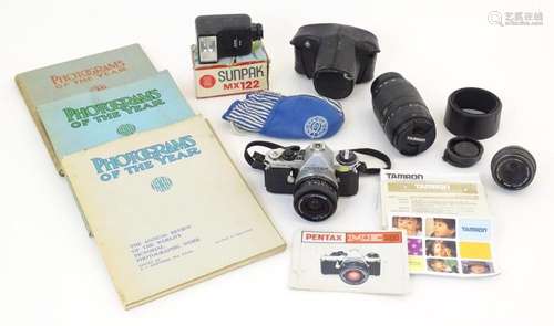 A quantity of mid 20thC camera equipment and photographic bo...