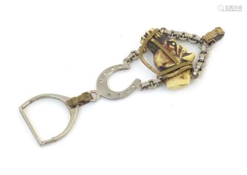 A 20thC chatelaine hanger with horse head, horseshoe and sti...