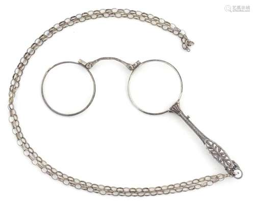 Early 20thC ladies folding lorgnette spectacles on a silver ...