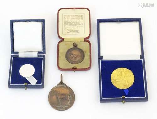 Four 20thC medallions / medals to include a silver gilt meda...