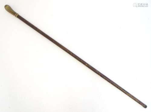 A 19thC walking cane / stick with horn handle. Approx. 35 1/...