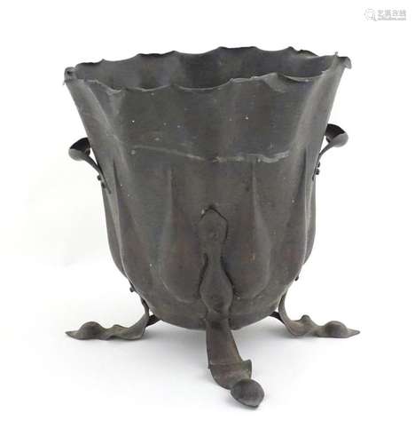 An Arts & Crafts copper planter / jardiniere of stylised...