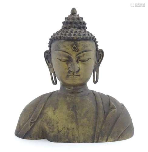 An Asian cast bronze bust modelled as a Buddha. Approx. 16 1...