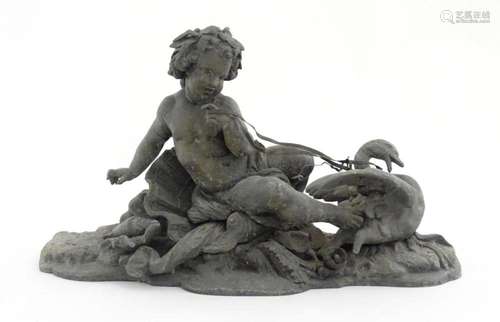 An early 20thC cast sculpture depicting a cherub on a shell ...