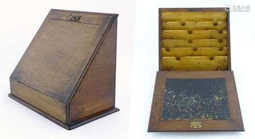 A late 19th / early 20thC oak slope fronted stationery box /...