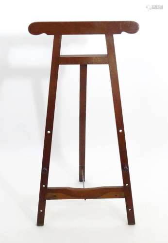 An early 20thC mahogany artist's easel, the uprights wit...