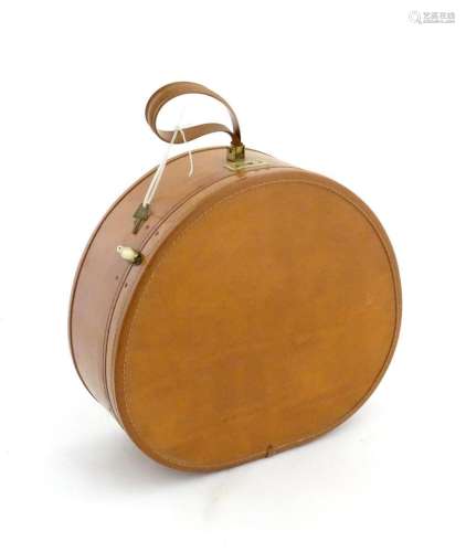 A vintage leather travelling / luggage hat box by Samsonite,...