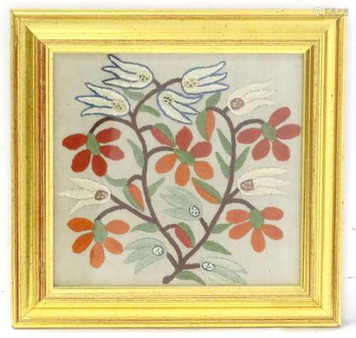 A Victorian needlework embroidery depicting a floral sprig w...