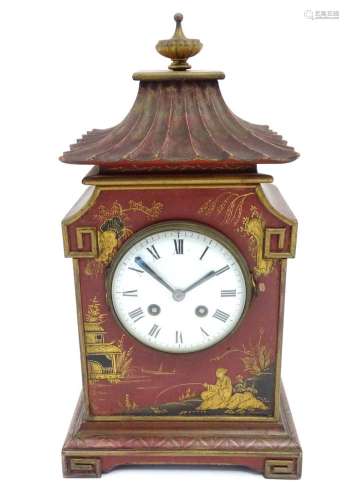 A French Chinoiserie mantle clock the white enamel dial with...
