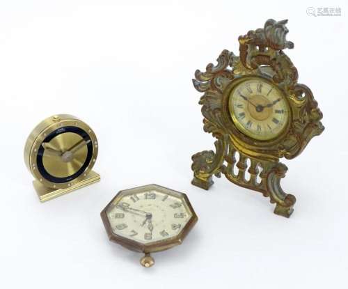 Three various clocks comprising an octagonal cased alarm clo...