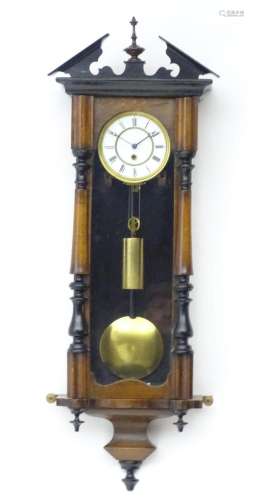A Victorian walnut cased Vienna regulator style wall clock w...