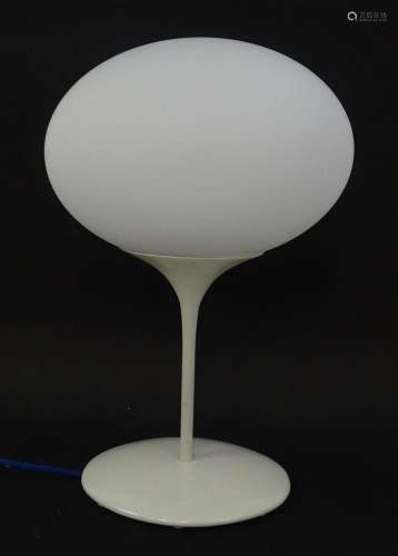 A Nimbus table lamp with glass shade, designed by Terance Co...