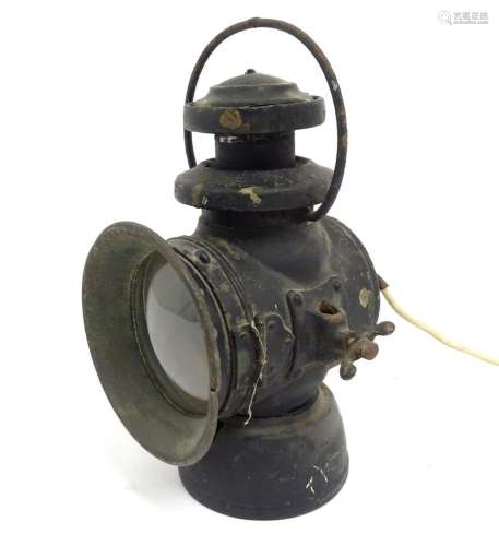 A lamp modelled from an old carbide railway lamp 13 1/2"...